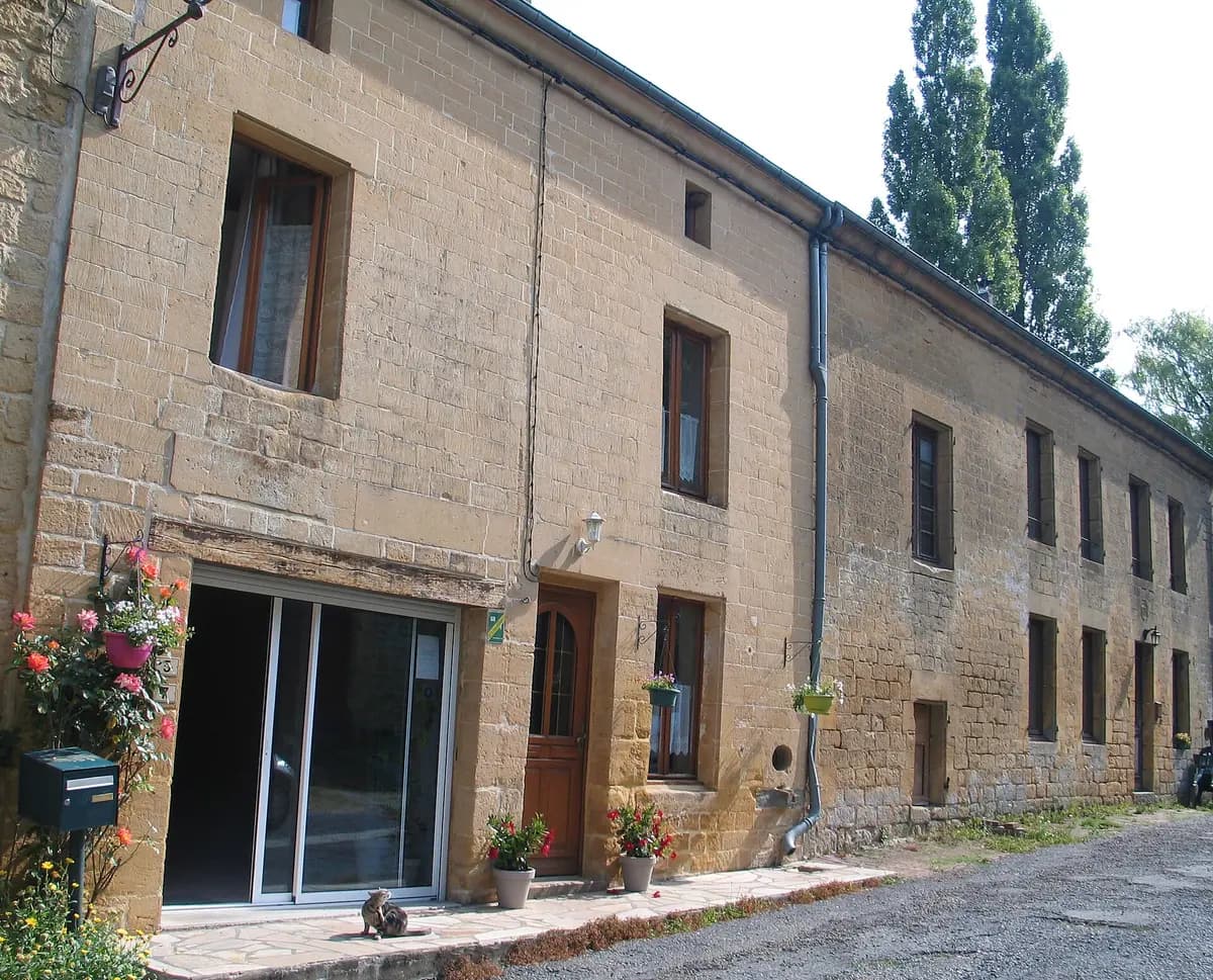 Stone facade of a chambre d'hôtes in Remilly-les-Pothées, in the Ardennes